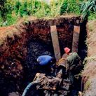 Sondeos Principado hombres trabajando en caño